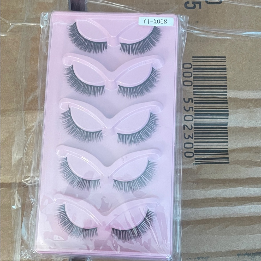Set of False Eyelashes on Pink Tray